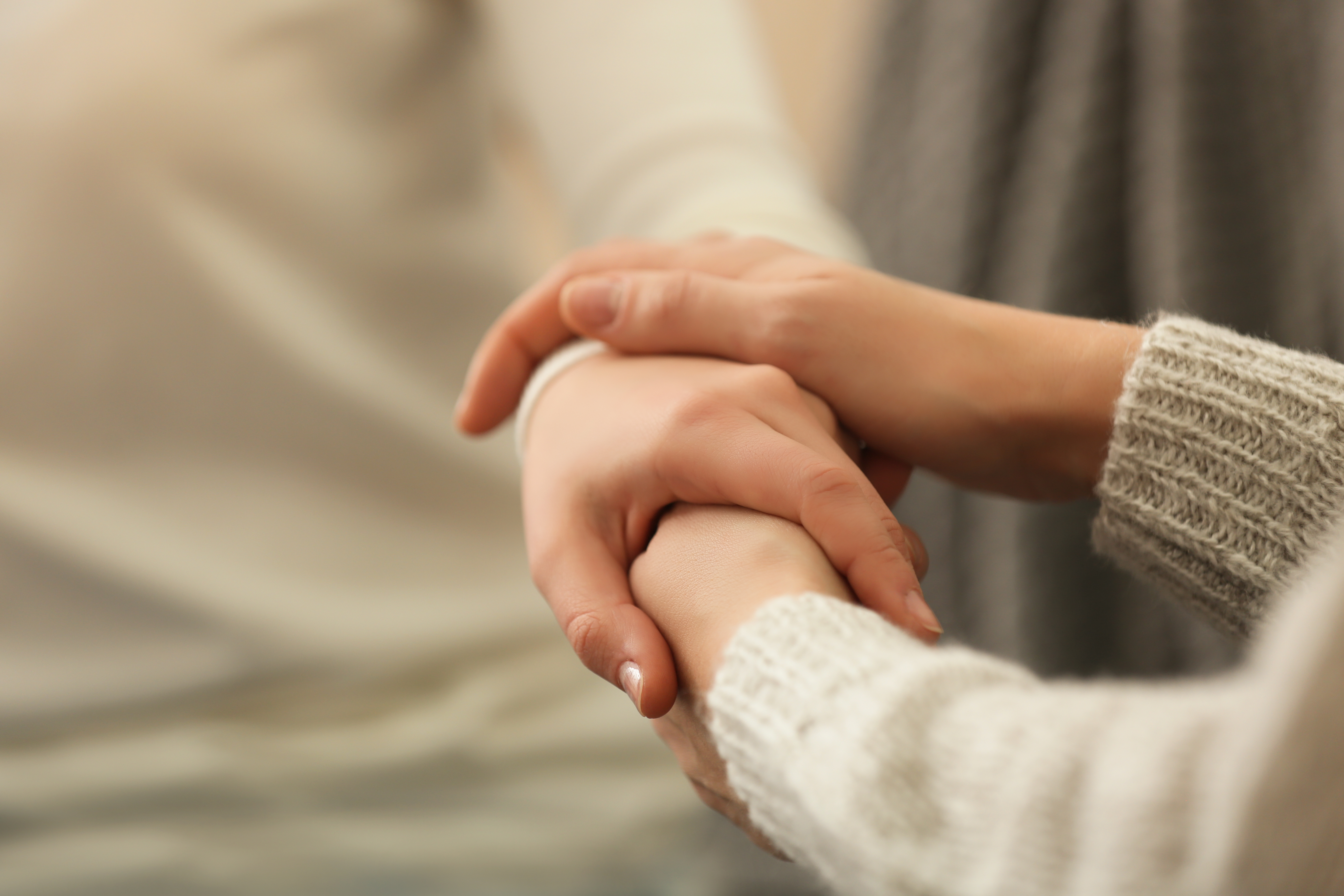 Woman's hands showing support and care